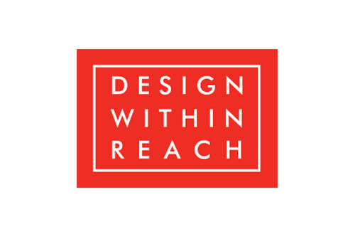 The image features a red rectangular logo with the text "DESIGN WITHIN REACH" in uppercase white letters. A thin white rectangular border encloses the text.