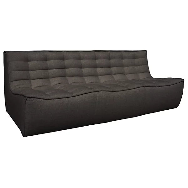 Experience the comfort and sleek, minimalist design of the N701 3 Seater Sofa by Ethnicraft. This dark gray, modern sofa features a low-profile, armless design with tufted cushions and a slightly curved back and seat for optimal lounging.