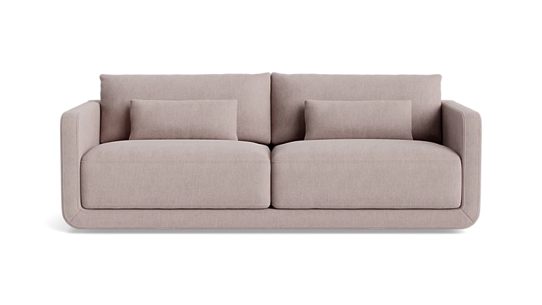 An 85-inch Eva sofa in beige, showcasing clean lines and a minimalist design with two large seat and back cushions, set against a plain black background.