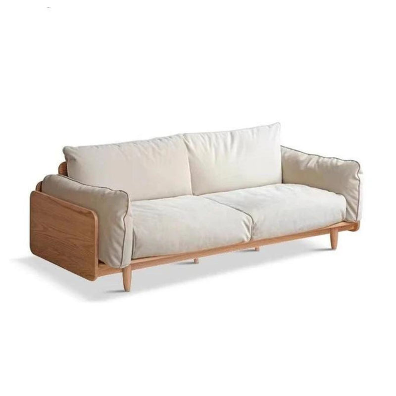 The Elwood 9-Seater Sofa features a modern design with a light wood frame and beige cushions. It includes soft armrests and a minimalist aesthetic, making it perfect for contemporary interiors.