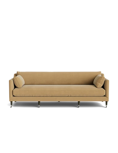 The Fabienne Sofa, in a beige finish, features two matching cushions on each end. It showcases a clean, minimalist design with tapered wooden legs and a low backrest, set against a plain white background.