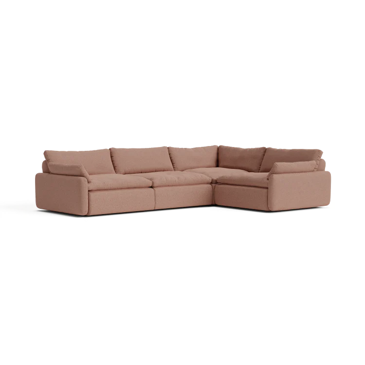 Introducing The Sink Down Sectional, a modern and spacious brown sofa that features three pieces configured in an L-shape. The plush cushions offer a comfortable seating experience, while its matte fabric finish perfectly complements any living room setting.