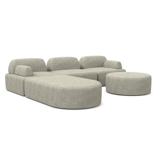 The Magna Preconfigured Sectional is showcased on a white background, boasting a modular gray fabric design with a large L-shaped section and a rounded ottoman. It features a minimalist style with smooth edges and no visible legs.