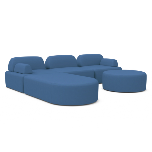 The Magna Preconfigured Sectional is a modular blue sofa set that includes a matching round ottoman. It boasts a stylish, minimalist design with rounded edges and low-profile backrests, perfectly complemented by a neutral background.