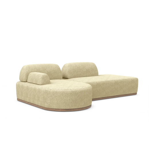 Introducing the Magna Preconfigured Sectional: a modern beige modular sofa featuring plush cushions and a low backrest. Its design includes rounded edges and a wooden base, providing a contemporary and comfortable seating option.