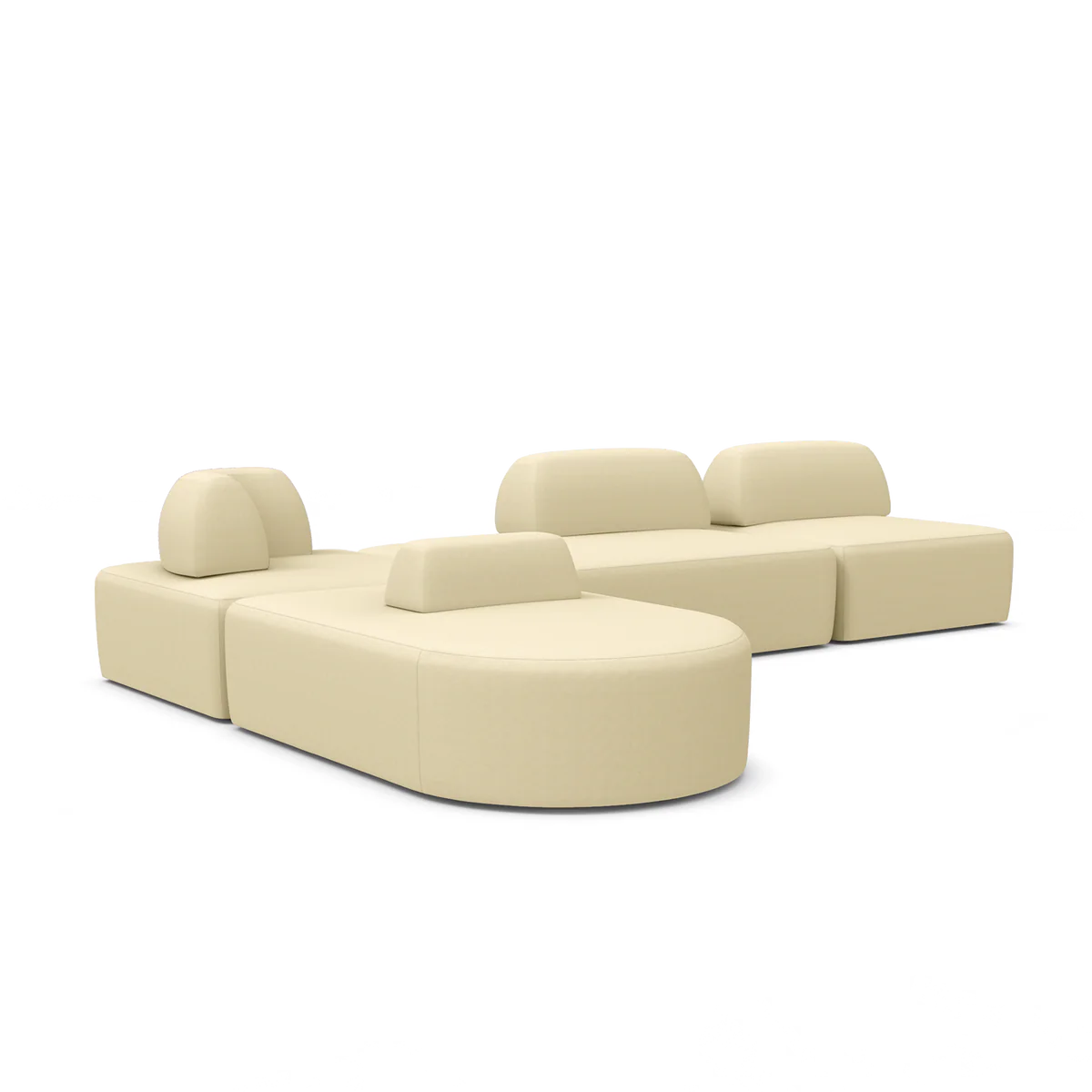 The Magna Preconfigured Sectional is a beige modular sofa set with rounded edges and detachable cushions, arranged in two sections. The left section includes an ottoman with two cushions, while the right section consists of a straight sofa with three back cushions.