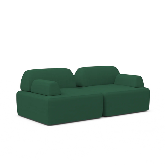 The Magna Preconfigured Sectional is a contemporary-styled, modern sofa featuring wide cushions and a low backrest in a minimalist green design. It boasts blocky armrests and an elegantly sleek appearance, set against a plain white background.