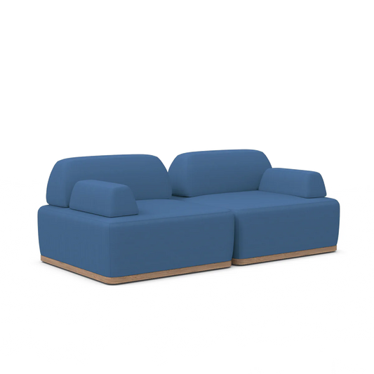 The Magna Preconfigured Sectional is a modern two-seater sofa with blue upholstery and a wooden base, featuring sleek square armrests and backrests set against a white background.