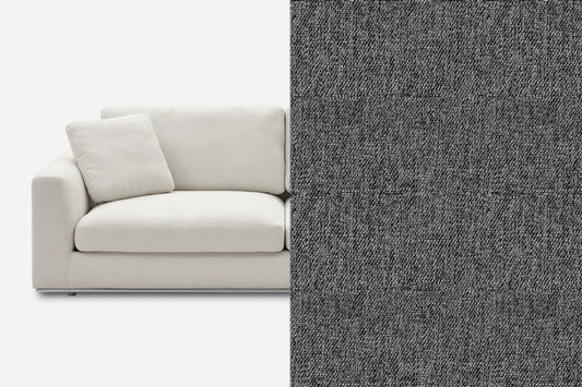 Split image showing a light gray sofa on the left with a matching pillow and a close-up texture of dark gray fabric on the right.