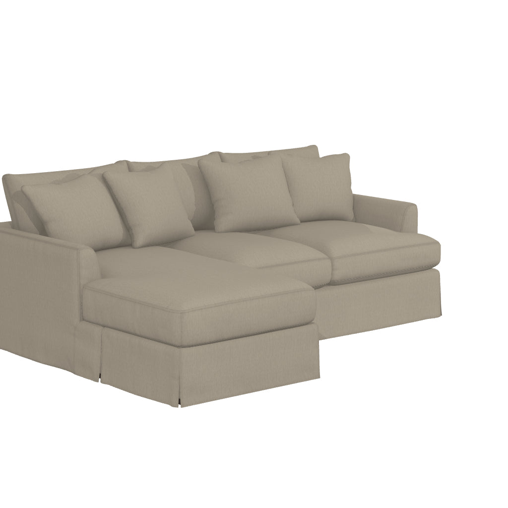 The Ava Chaise Slipcovered Sofa is a beige sectional featuring three seat cushions and a left-side chaise lounge. It comes with four matching throw pillows and is displayed against a plain white background.