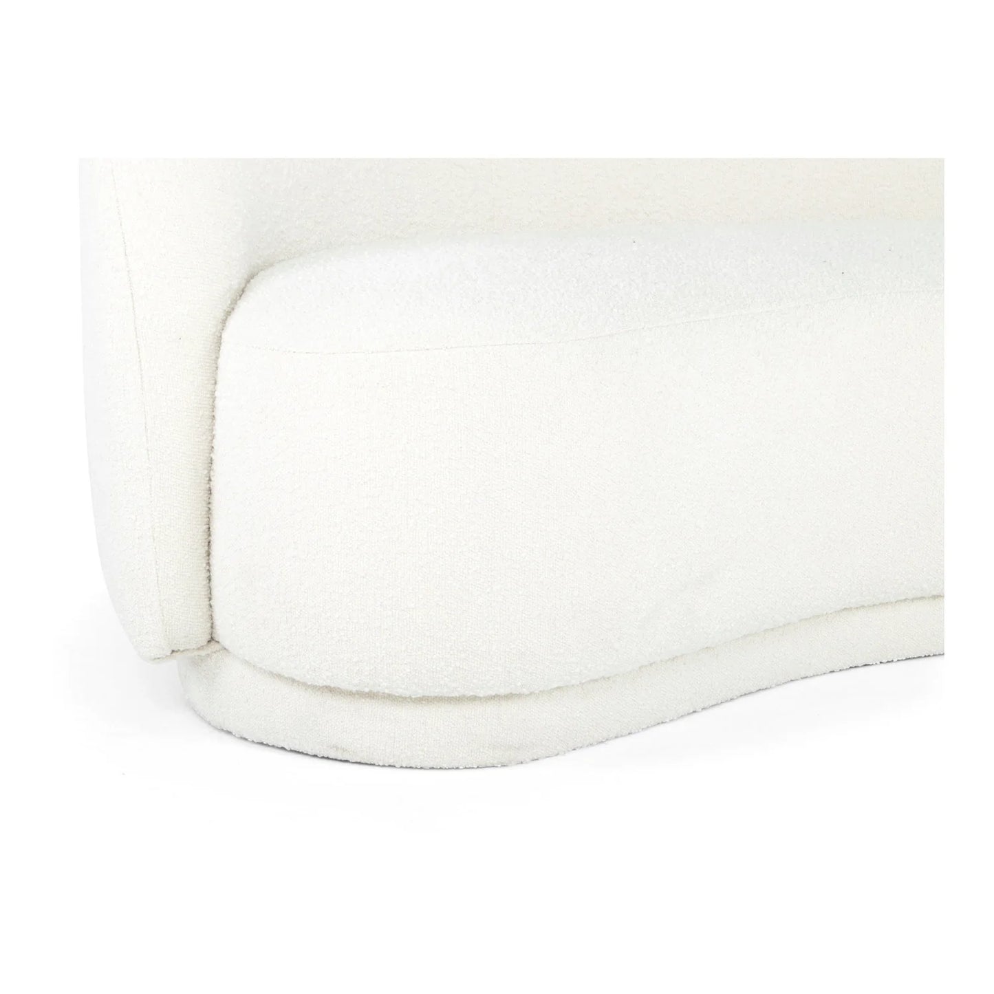 Close-up of the Excelsior Sofa Cream cushion featuring a white, plush, rounded design. The fabric has a soft, textured appearance, accented by the sofa's smoothly curved edge for a cozy and inviting look.