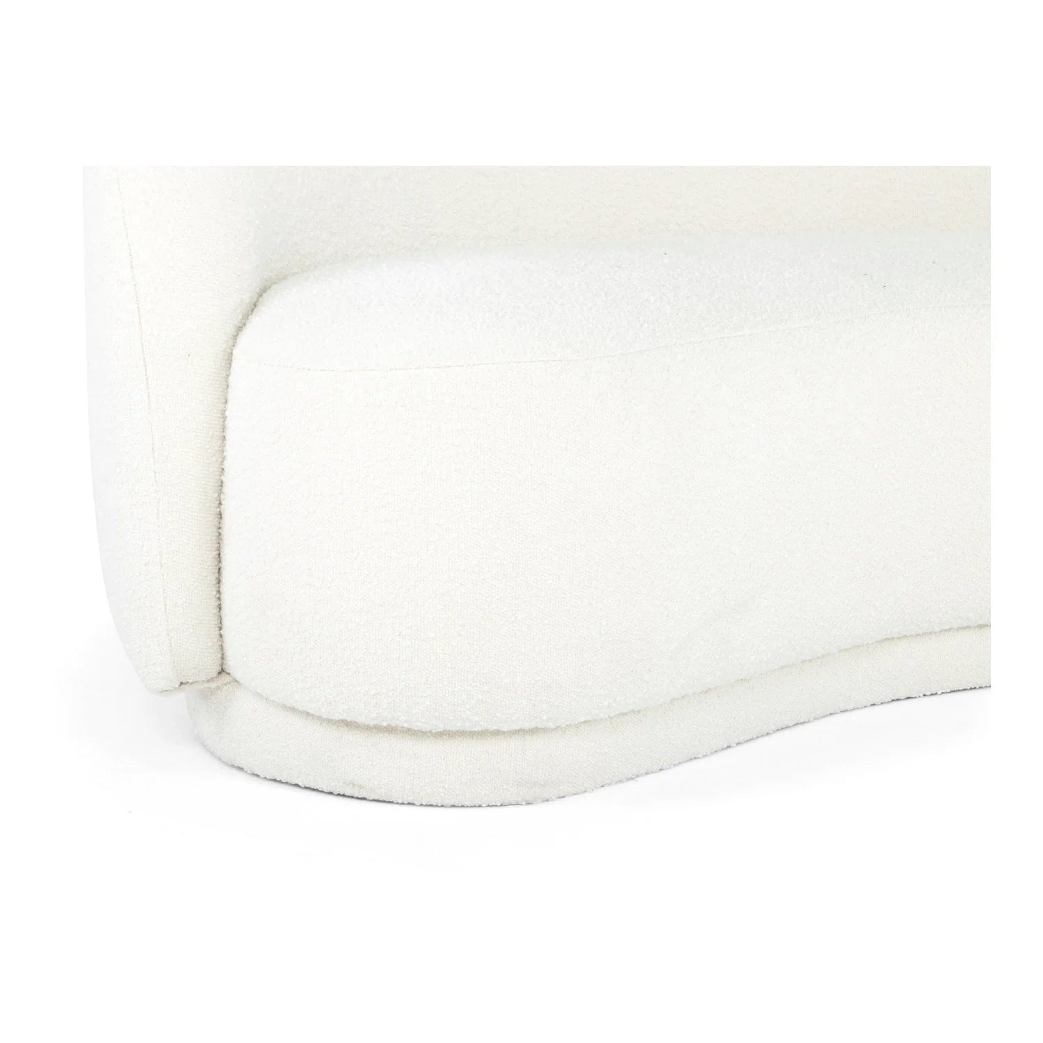 Close-up of the Excelsior Sofa Cream cushion featuring a white, plush, rounded design. The fabric has a soft, textured appearance, accented by the sofa's smoothly curved edge for a cozy and inviting look.