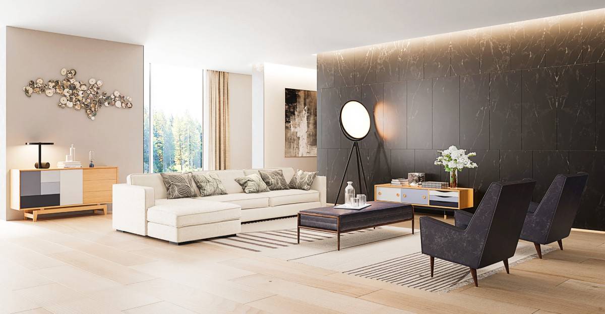 Modern living room with a light-colored sectional sofa, black armchairs, and a central coffee table on a striped rug. A large, circular floor lamp stands next to a credenza with flowers. The back wall features dark panels and wall art, enhancing the room's elegance.