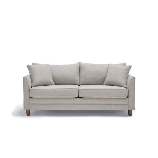 The Kodie 76.5" Upholstered Sleeper Sofa is a modern piece in light gray, featuring wooden legs with a simple design that includes two seat cushions and three back cushions. It comes with two matching throw pillows and is shown against a plain white background.