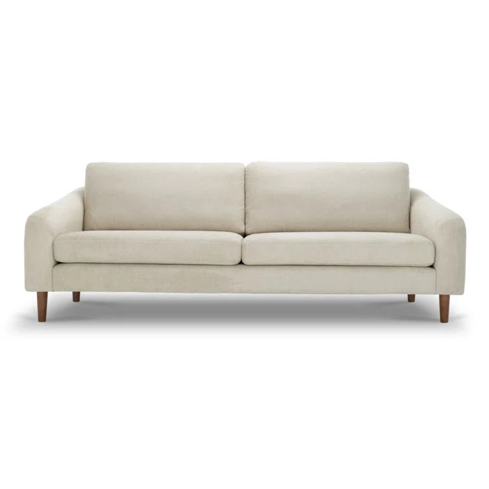 The Lana 85'' Upholstered Sofa, showcasing a minimalist design in beige with wooden legs, includes two seat cushions and a straight backrest. It is set against a plain white background.