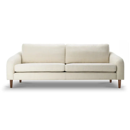 The Lana 85'' Upholstered Sofa in beige, featuring a modern design with two cushions and wooden legs, is set against a plain white background.