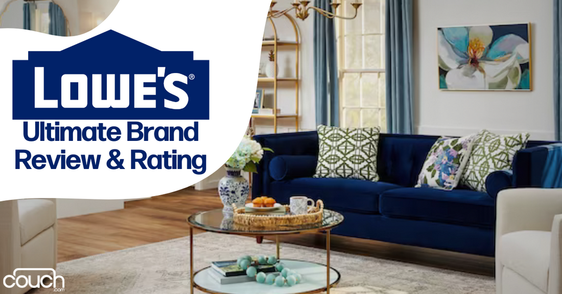 A living room with a dark blue couch adorned with patterned pillows, a glass coffee table, floral artwork, and large windows with blue curtains. Text overlay reads "Lowe's Ultimate Brand Review & Rating," and a "Couch" logo is visible in the corner.