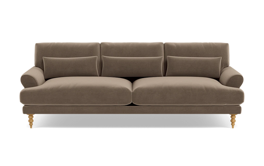 The Maxwell Custom Sofa is a brown, three-seater featuring tufted back cushions and two seat cushions. It is designed with rolled arms and wooden legs that sport a decorative turned design. The sofa is displayed against a plain, white background.