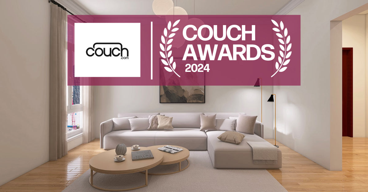 A modern living room with a beige sectional sofa, round coffee tables, and neutral decor. A banner in the foreground reads "COUCH AWARDS 2024" next to the Couch.com logo.