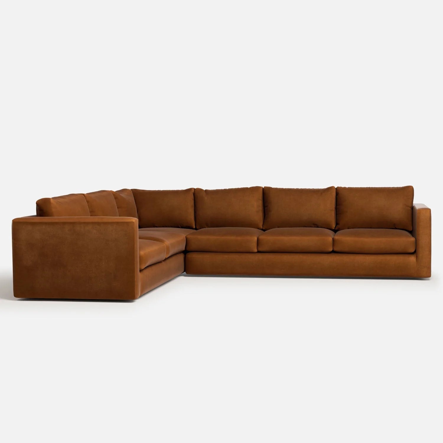 The Milo Sectional is a spacious, L-shaped sofa with brown fabric upholstery. It boasts clean lines and plush cushions, offering a contemporary appearance against a plain white background.