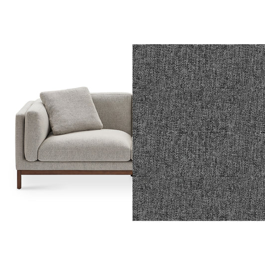 An Owen Chaise Sectional Sofa with a modern gray cushion and a wooden base is depicted partially on the left side, accompanied by a gray textured fabric swatch on the right. A matching square cushion rests atop the sofa.