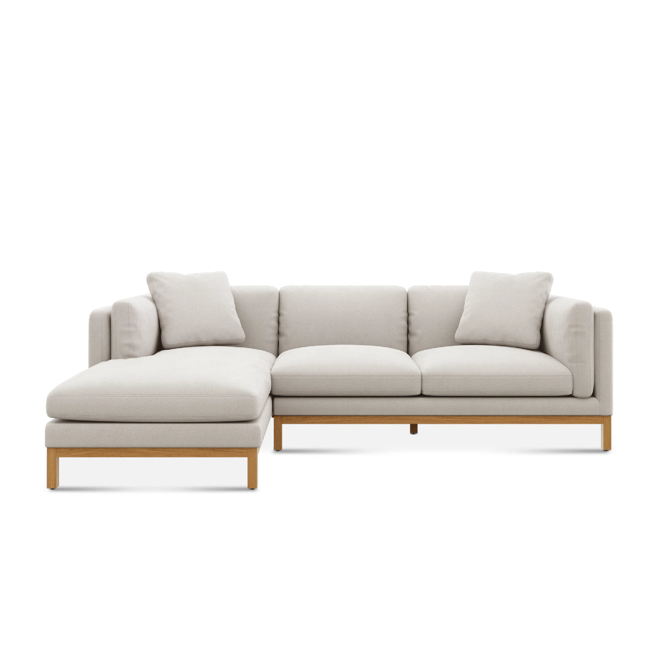 Introducing the Owen Chaise Sectional Sofa: a contemporary L-shaped piece with light gray upholstery and wooden legs. This modern design includes three seat cushions, a left-side chaise, and three back cushions, epitomizing minimalist style.