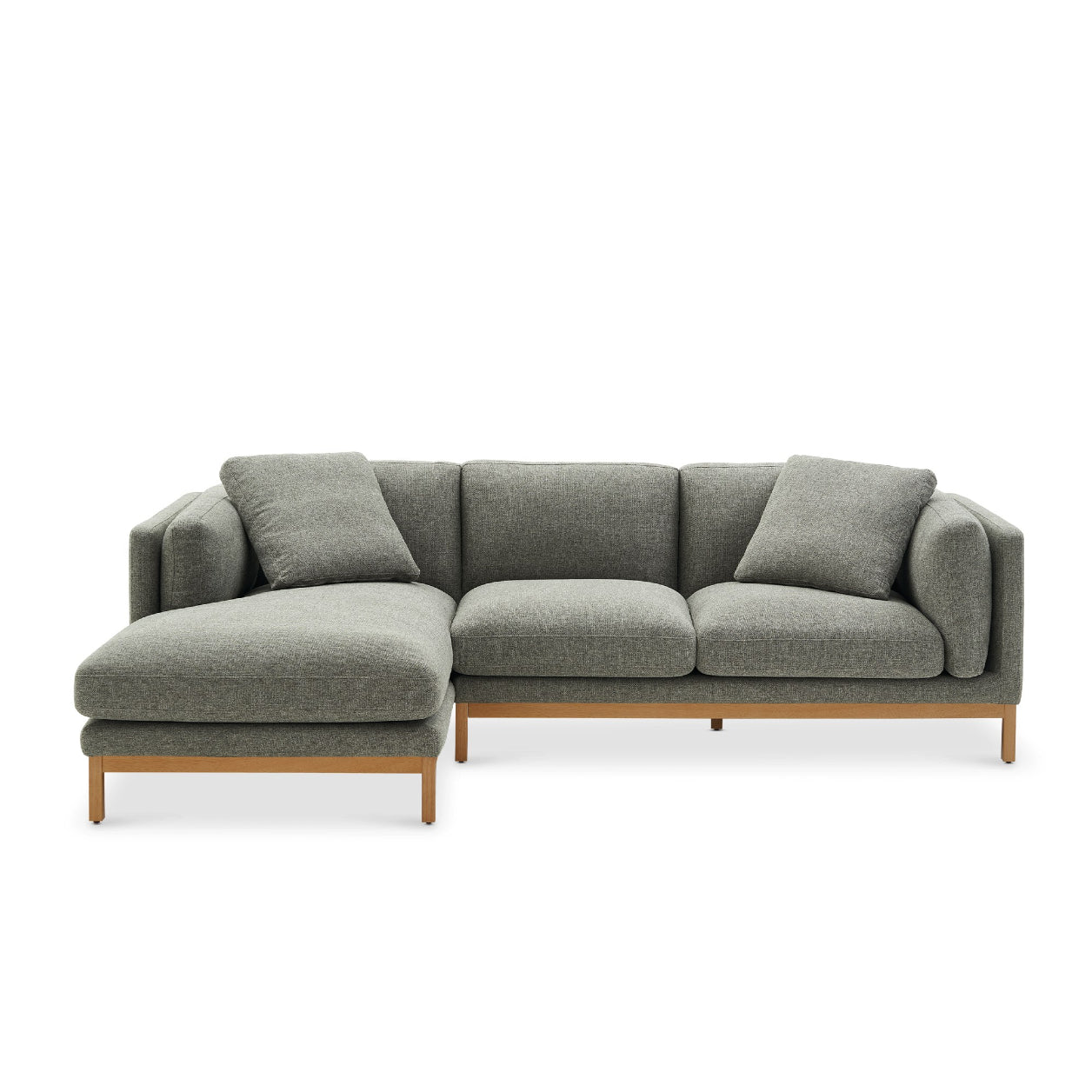 The Owen Chaise Sectional Sofa is a stylish L-shaped piece in gray, featuring wooden legs and three cushions.