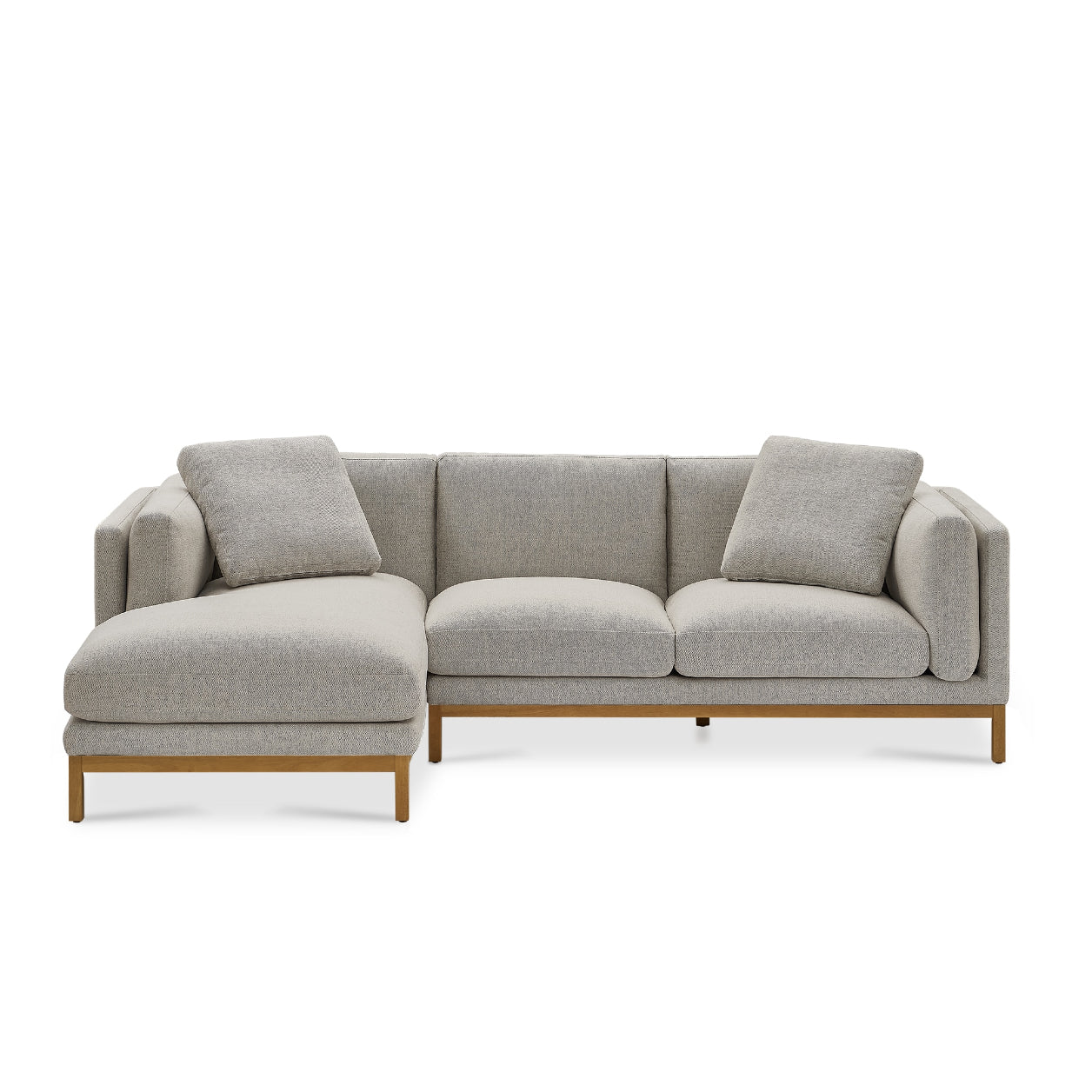 Introducing the Owen Chaise Sectional Sofa, a contemporary gray sectional featuring wooden legs. This sofa provides plush cushions and includes a left-side chaise lounge for an inviting L-shaped seating arrangement.