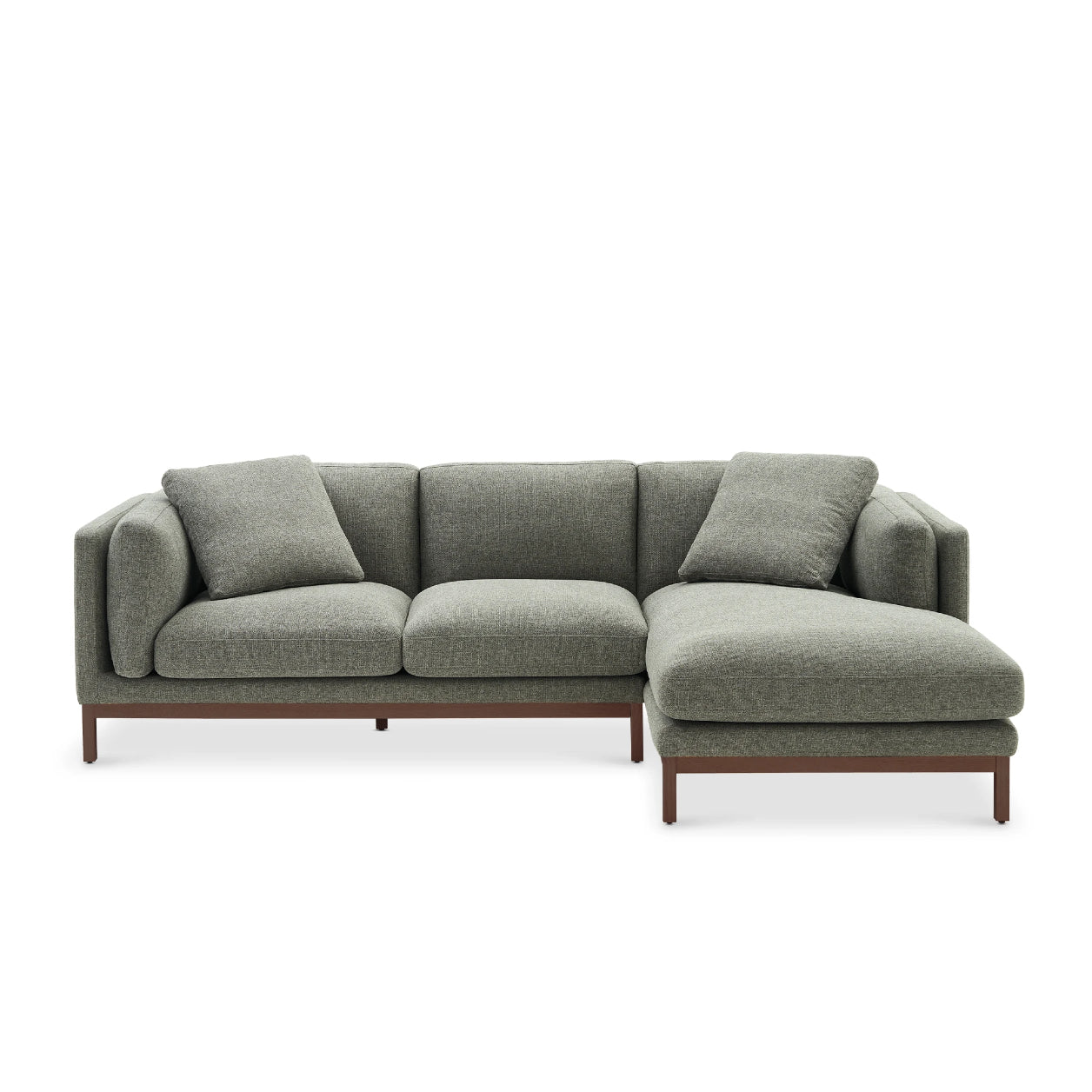 The Owen Chaise Sectional Sofa is a contemporary green L-shaped piece featuring three cushions and a right-side chaise lounge, boasting a minimalist design with a low-profile, dark wooden frame.