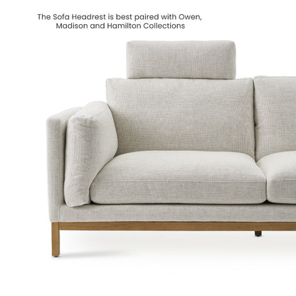 A contemporary Owen Chaise Sectional Sofa in light gray, highlighted by a headrest and featuring cushioned armrests and a wooden base. The text above suggests, "The Sofa Headrest pairs beautifully with the Owen, Madison, and Hamilton Collections.