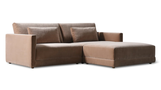 The Wind Down 4-Piece Modular Sectional is a contemporary brown sectional sofa with a right-side extended chaise, clean lines, and cushioned backrests. It comes with two rectangular pillows and is showcased against a plain white background.