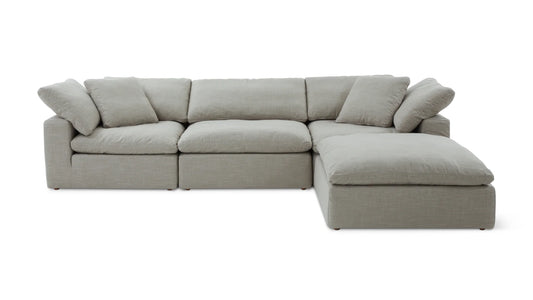 Introducing the Movie Night 3-Piece Modular Sofa: a modern design in light gray with multiple cushions and a chaise lounge on the right side, upholstered in soft fabric for a comfortable and inviting look.