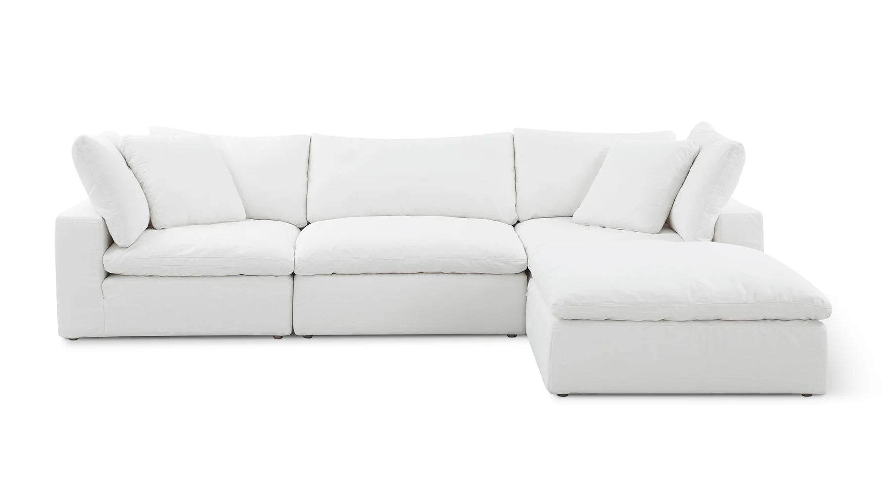 Introducing the Movie Night 3-Piece Modular Sofa: a spacious, modern white sectional featuring plush cushions and a right-side chaise lounge. Its sleek design makes it an ideal fit for contemporary living spaces.