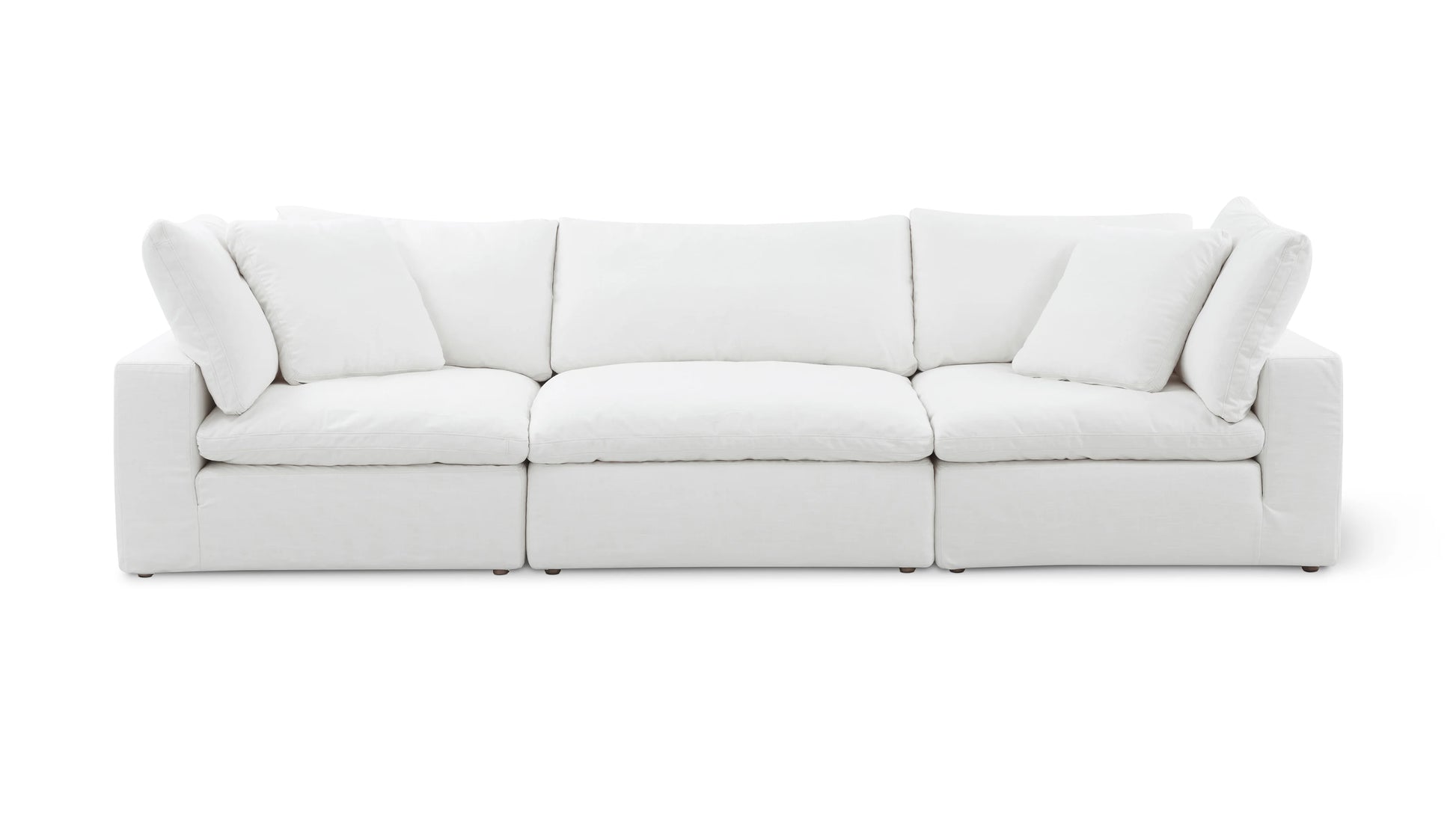 The Movie Night 3-Piece Modular Sofa is a modern white sofa with plush cushions, featuring three sections. Its clean lines and minimalist design offer a cozy yet stylish look, perfect for contemporary living spaces.