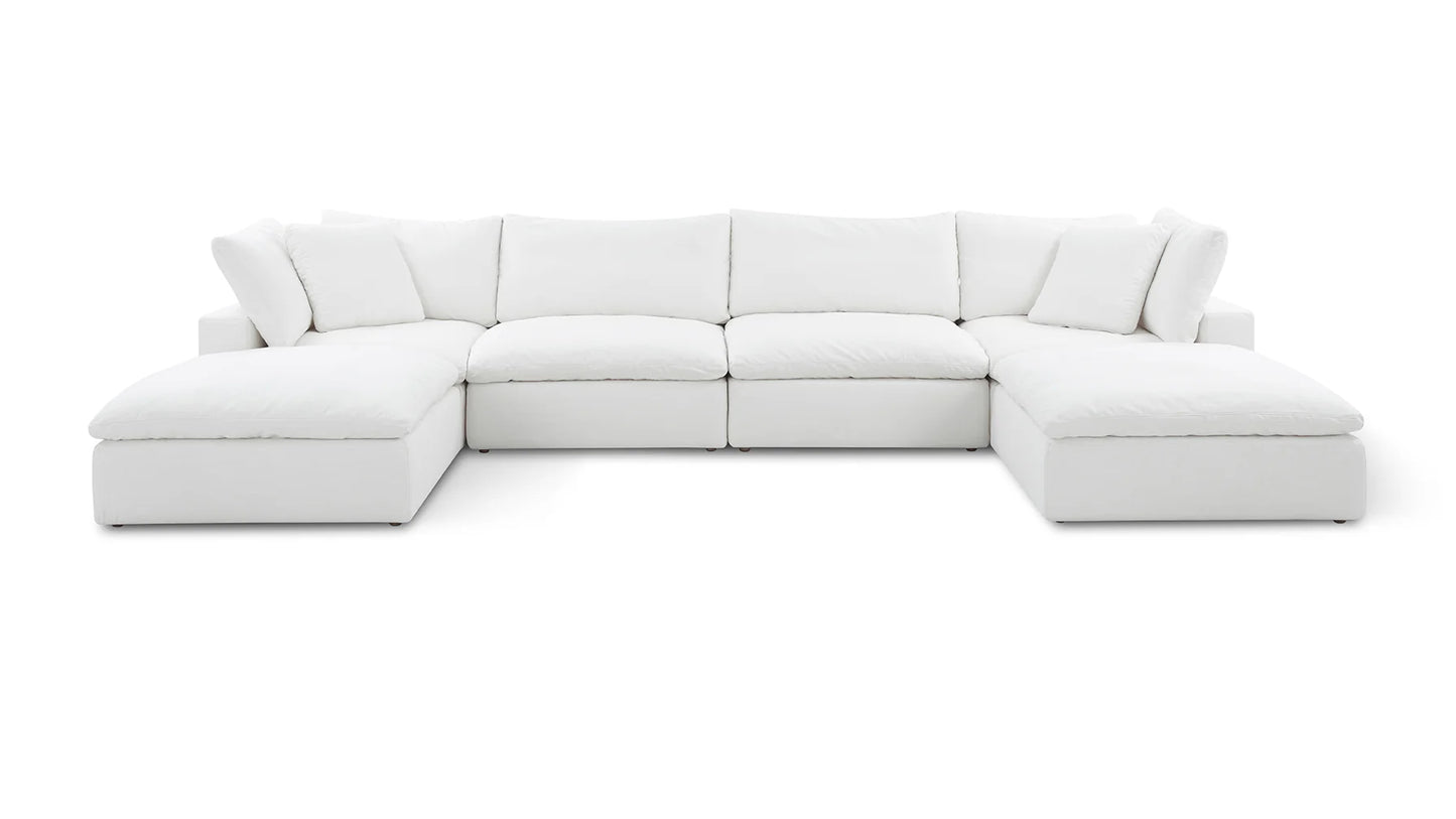 The Movie Night 3-Piece Modular Sofa is a large white sectional with plush cushions and a modular design. It features deep seats and an L-shaped configuration, making it ideal for spacious living rooms.