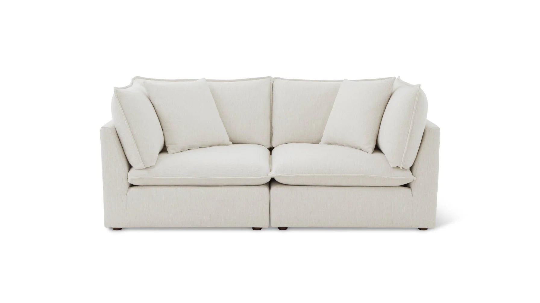 Against a plain white background, there is the Chill Time 4-Piece Modular Sectional in light beige, featuring space for two with its high back cushions and square armrests.