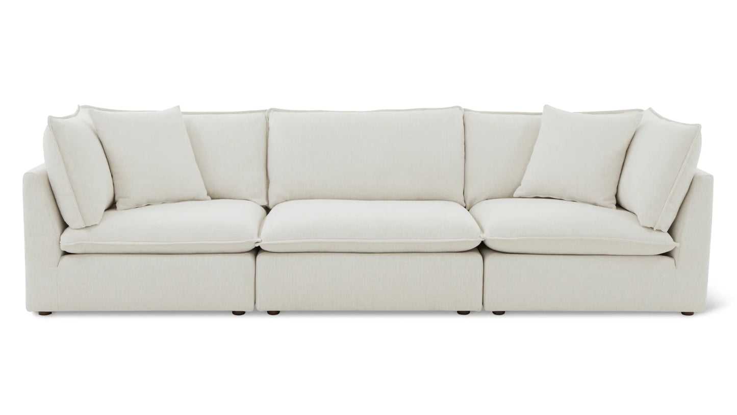 The Chill Time 4-Piece Modular Sectional in beige offers three seat cushions and four large back cushions. With its clean lines and contemporary design, it adds a modern touch to any space.