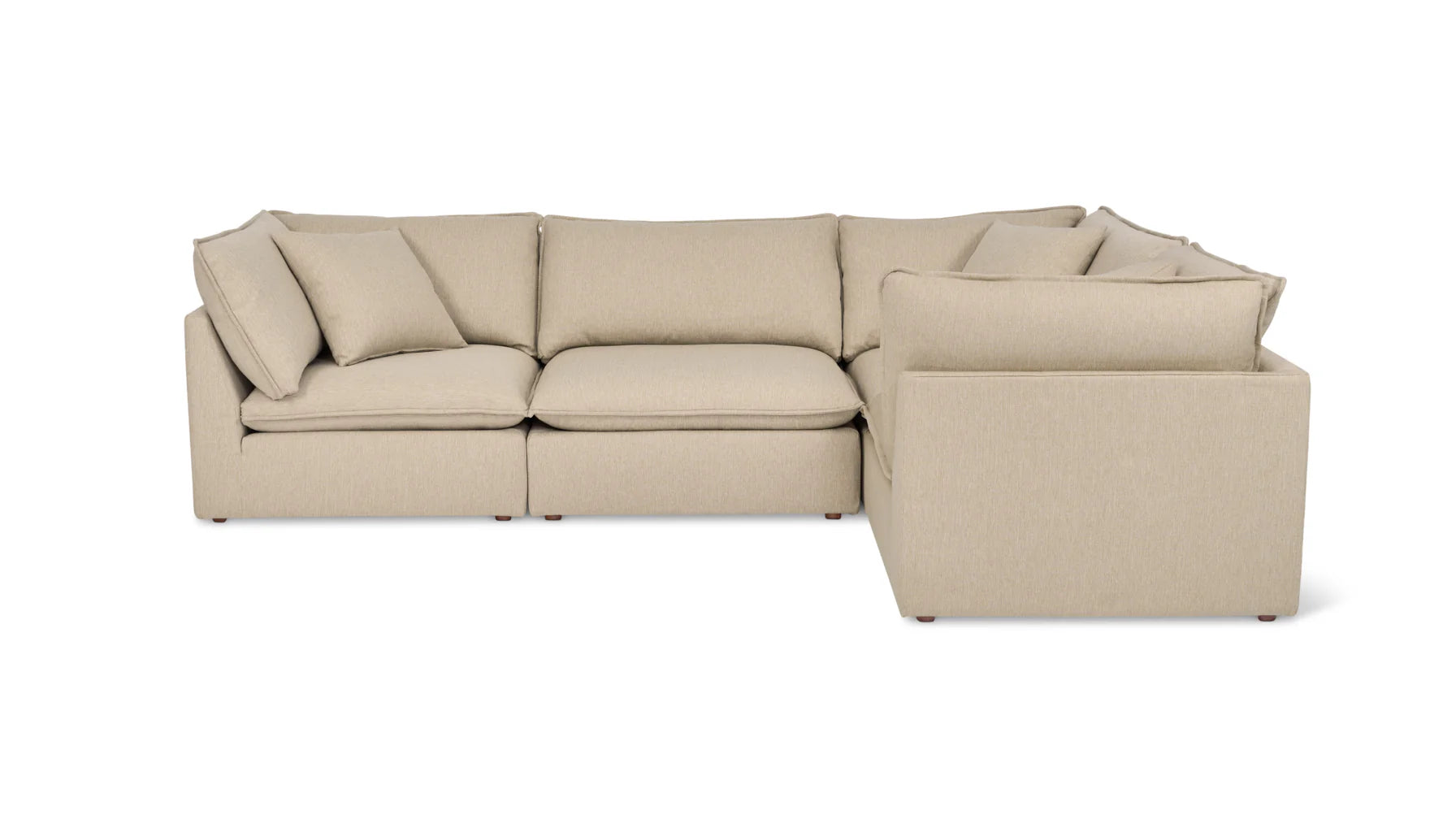 Introducing the Chill Time 4-Piece Modular Sectional: a beige, L-shaped sectional sofa featuring plush cushions and a sleek, modern design. Crafted with soft fabric, this sectional offers a spacious seating area ideal for any living room.