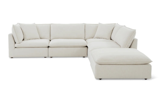 The Chill Time 4-Piece Modular Sectional is an L-shaped beige sofa with plush cushions and a minimalist style, set against a plain white background.