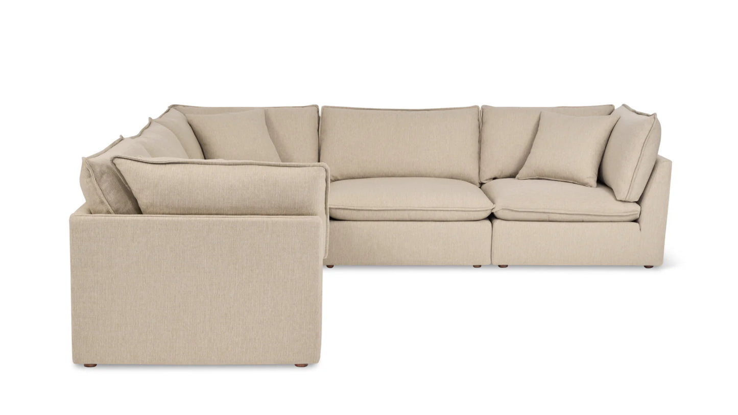 The Chill Time 4-Piece Modular Sectional, featuring plush cushions and an L-shaped design in beige, is set against a white background.