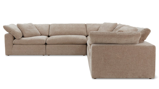 The Movie Night 3-Piece Modular Sofa, featuring plush cushions and a minimalist design in beige, is set against a white background.