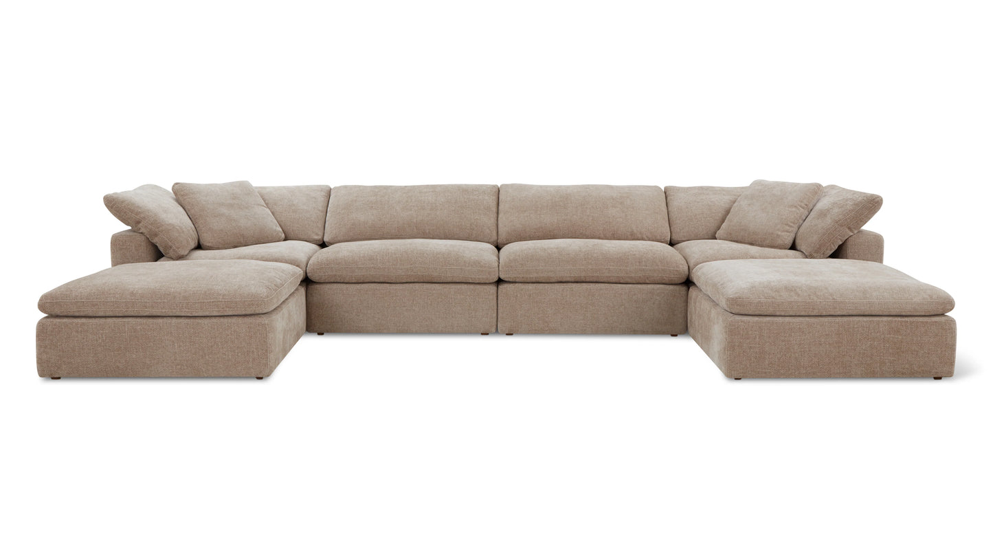 Introducing the Movie Night 3-Piece Modular Sofa: a spacious, beige sectional with five plush cushioned seats and a chaise on either end, meticulously designed in a U-shape. Its soft and inviting upholstery makes it an excellent choice for any living room arrangement.