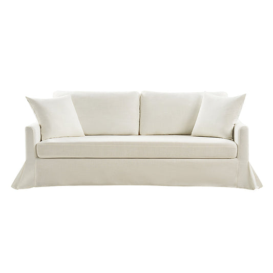 Introducing the Torsten Modern Comfortable Sofa, a white three-seater designed with two large back cushions and two smaller side cushions. Its floor-length tailored skirt adds a touch of elegance and sophistication to any space.