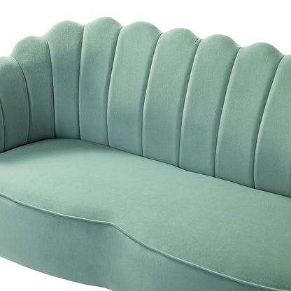 The Ariel Scalloped Loveseat in mint-green velvet showcases a plush design featuring a scalloped, vertically paneled backrest and a smooth seat cushion, displayed against a white background.