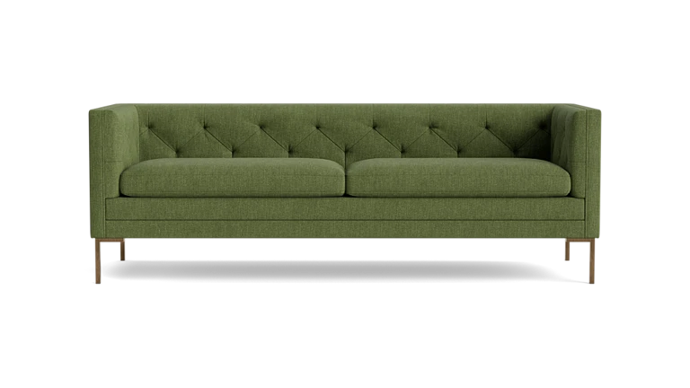 Product: Sit Tight 90" Sofa - A green tufted design featuring two seat cushions and wooden legs, presented against a black backdrop.