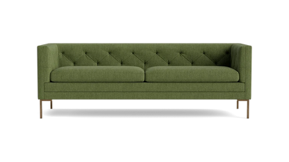 Product: Sit Tight 90" Sofa - A green tufted design featuring two seat cushions and wooden legs, presented against a black backdrop.