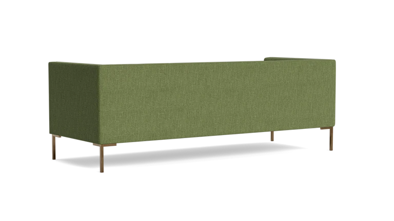 The Sit Tight 90" Sofa, featuring a sleek minimalist design in green, is shown from the back. It stands on four slender wooden legs, exuding a modern appearance against a solid black background.