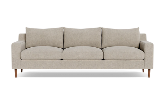 The Sloan Custom 3-Seat 95" Sofa features three seats and boasts a minimalist and modern design with its straight arms and wooden legs. It comes in beige and includes three back cushions along with three seat cushions.