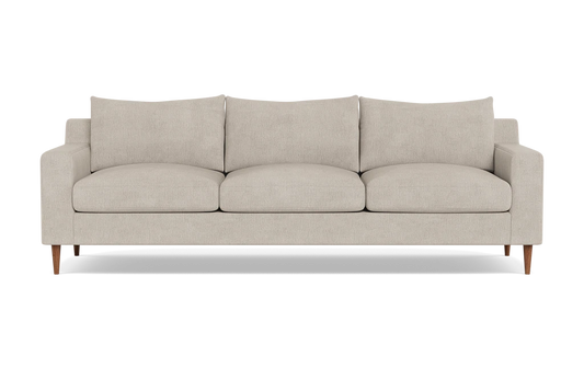 The Sloan Custom 3-Seat 95" Sofa is a modern beige sofa featuring streamlined, rectangular cushions and slim wooden legs, positioned against a plain black background.