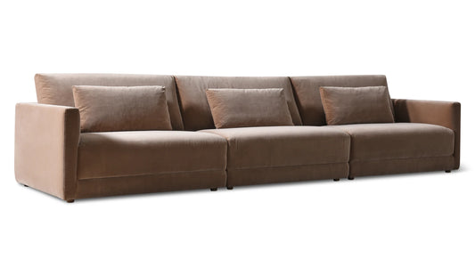 The Wind Down 4-Piece Modular Sectional, featuring a modern design in brown with plush cushions and clean lines, is displayed on a white background.